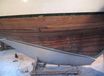 Mating up the new keel to the boat