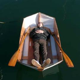 Relax in a woodenwidget dinghy
